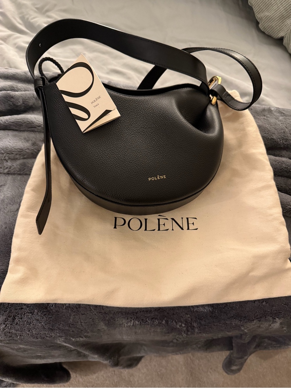 Polène Black Pebbled Leather Crescent Shoulder Bag
